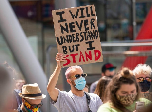 Demonstrators stage a peaceful protest at Times Square in Newcastle. Picture: North News.