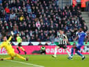 Miguel Almiron of Newcastle United scores the team's second goal past Danny Ward of Leicester City during the Premier League match between Leicester City and Newcastle United at The King Power Stadium on December 26, 2022 in Leicester, England. (Photo by Marc Atkins/Getty Images)