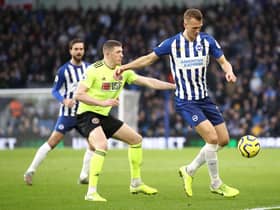 Dan Burn in action for Brighton and Hove Albion. (Photo by Bryn Lennon/Getty Images)