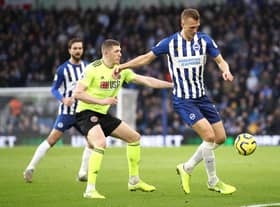 Dan Burn in action for Brighton and Hove Albion. (Photo by Bryn Lennon/Getty Images)