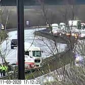 A truck has collided with the central reservation.  Picture by North East Traffic Live.