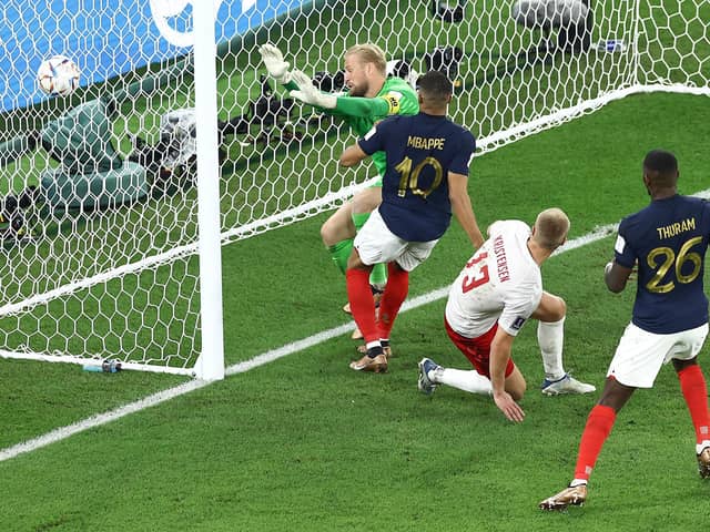 Any body part will do: Kylian Mbappe of France scores the team's second goal past Kasper Schmeichel of Denmark  (Picture: Tim Nwachukwu/Getty Images,)