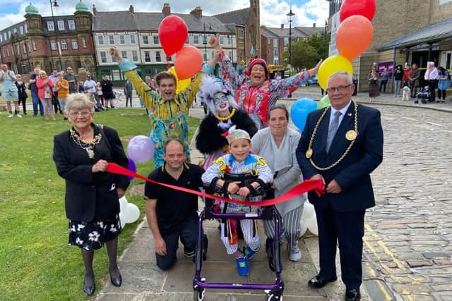 Nine-year-old Stephen Idle pictured with Customs House panto stars, the Mayor and Mayoress of South Tyneside and his family as he reached the end of his walking challenge.