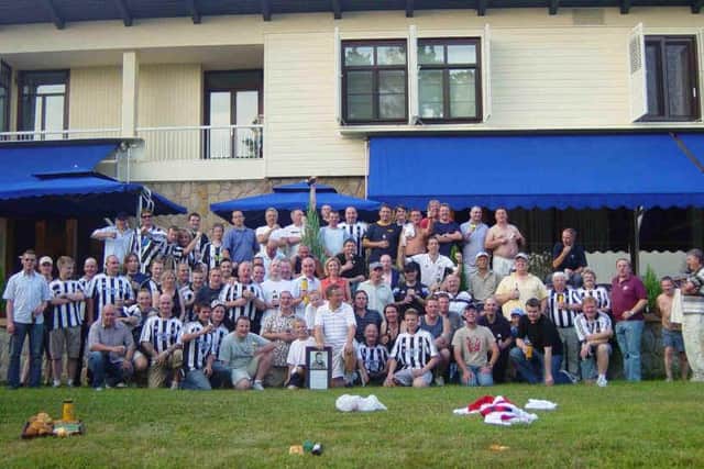 Newcastle United fans a the British Ambassador's residence in Belgrade in 2003.