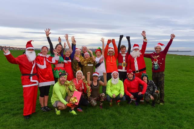 Luke Adams, back row second from right, before a previous festive fun run. Picture by Kevin Brady.