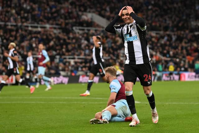 Miguel Almiron of Newcastle United reacts after a missed chance during the Premier League match between Newcastle United and Burnley at St. James Park on December 04, 2021 in Newcastle upon Tyne, England. (Photo by Stu Forster/Getty Images)