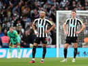 Joelinton (L and Sven Botman of Newcastle United look dejected after the Manchester United second goal during the Carabao Cup Final match between Manchester United and Newcastle United at Wembley Stadium on February 26, 2023 in London, England. (Photo by Julian Finney/Getty Images)