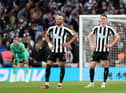 Joelinton (L and Sven Botman of Newcastle United look dejected after the Manchester United second goal during the Carabao Cup Final match between Manchester United and Newcastle United at Wembley Stadium on February 26, 2023 in London, England. (Photo by Julian Finney/Getty Images)