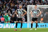 Joelinton (L and Sven Botman of Newcastle United look dejected after the Manchester United second goal during the Carabao Cup Final match between Manchester United and Newcastle United at Wembley Stadium on February 26, 2023 in London, England. (Photo by Julian Finney/Getty Images)