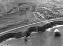A retro view of Marsden Rock and the houses on the coastline. Does this bring back happy memories?