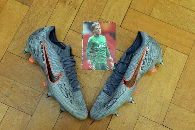 SS Peter and Paul Catholic Primary School are to raffle Jordan Pickford's boots as part of the Christmas appeal.