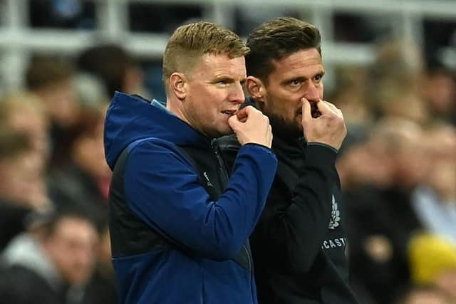 Newcastle United head coach Eddie Howe with his assistant Jason Tindall. (Photo by PAUL ELLIS/AFP via Getty Images)