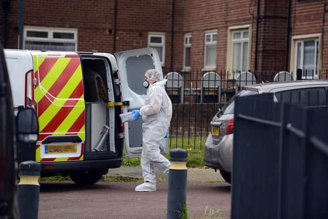 Forensic teams could be seen in Victoria Road, South Shields, as evidence was gathered as part of the murder probe.