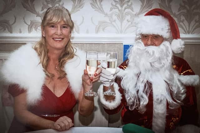 Mick and Margaret Gurr dressed as Mr and Mrs Clause on their wedding day