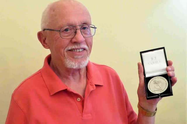 Don Pinchbeck of Emmuas North East with his Founders' Medal