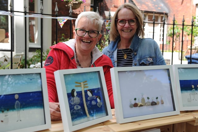 Caroline Corkin and Catherine Wells show off some artistic creations.