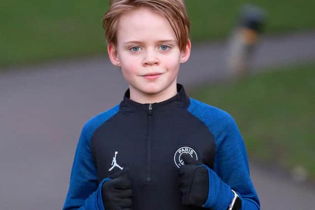 Henry Hogan, 10, has raised more than £500 for Cancer Research UK through his several-month-long 'lockdown run'