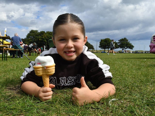 Molly Roberts cools off with a refreshing ice cream.