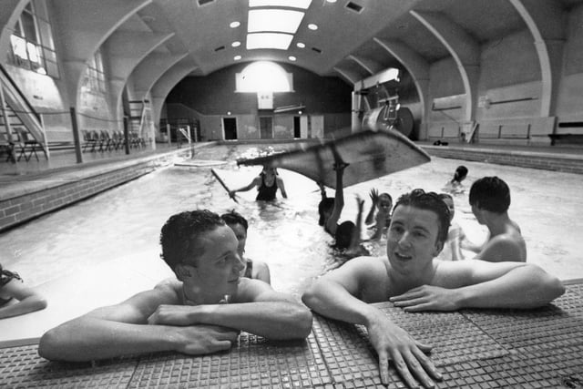 Karl Peacock and Ian Gardener take a rest as youngsters enjoy their last day at Derby Street baths in 1993.