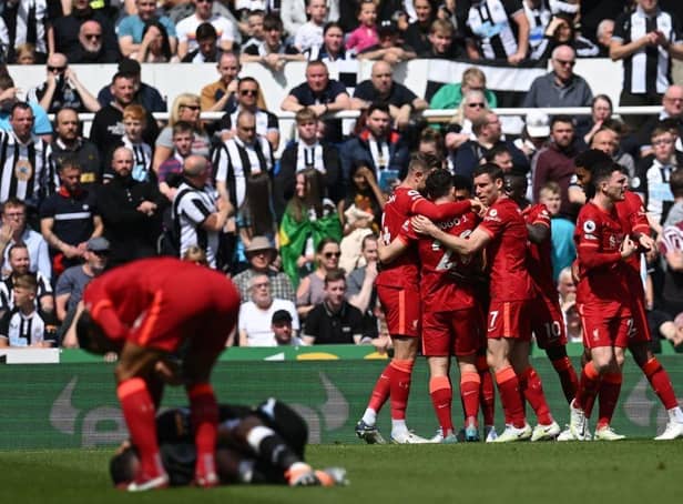 Liverpool celebrate scoring against Newcastle United (Photo by PAUL ELLIS/AFP via Getty Images)