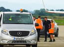 Actor Tom Cruise is greeted after touching down at Teesside International Airport.