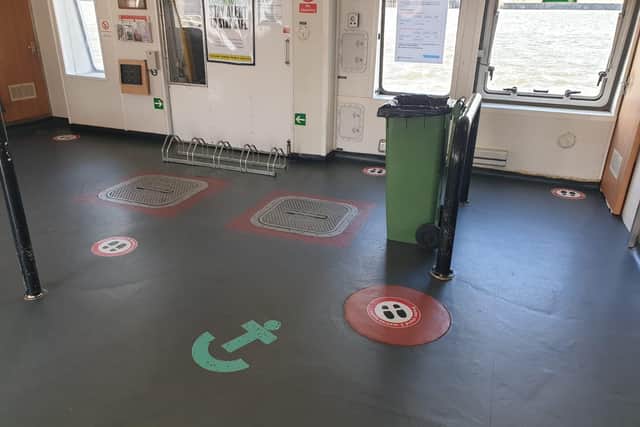 New signage and floor markings make sure people keep two metres apart.