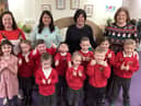 Staff and children at Biddick Hall Infants' School giving a thumbs up to their recent good Ofsted judgement. (left to right) Assistant headteacher Laura Burdon, Early Years lead Fiona Frazer, headteacher Andrea Willis and assistant headteacher Joanne Storey.