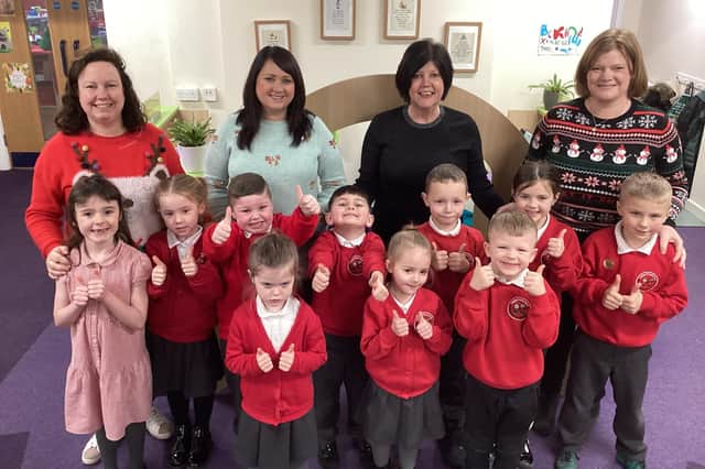 Staff and children at Biddick Hall Infants' School giving a thumbs up to their recent good Ofsted judgement. (left to right) Assistant headteacher Laura Burdon, Early Years lead Fiona Frazer, headteacher Andrea Willis and assistant headteacher Joanne Storey.