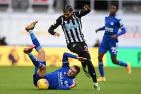 Leicester City's Belgian defender Timothy Castagne (L) vies with Newcastle United's US defender DeAndre Yedlin (C) during the English Premier League football match between Newcastle United and Leicester City at St James' Park in Newcastle-upon-Tyne, north east England on January 3, 2021.