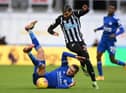 Leicester City's Belgian defender Timothy Castagne (L) vies with Newcastle United's US defender DeAndre Yedlin (C) during the English Premier League football match between Newcastle United and Leicester City at St James' Park in Newcastle-upon-Tyne, north east England on January 3, 2021.