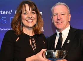 Louise Wanless being presented with the John Fotheringham Award by Kevin Ball in 2019 at a ceremony held at Ramside Hall.