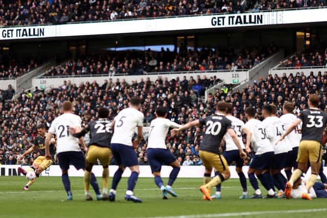 Fabian Schar of Newcastle United scores their sides first goal during the Premier League match between Tottenham Hotspur and Newcastle United at Tottenham Hotspur Stadium on April 03, 2022 in London, England. (Photo by Ryan Pierse/Getty Images)