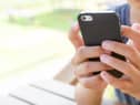 Starting secondary school age is the time most young people get their first mobile phone. Photo Abode Stock