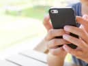 Starting secondary school age is the time most young people get their first mobile phone. Photo Abode Stock