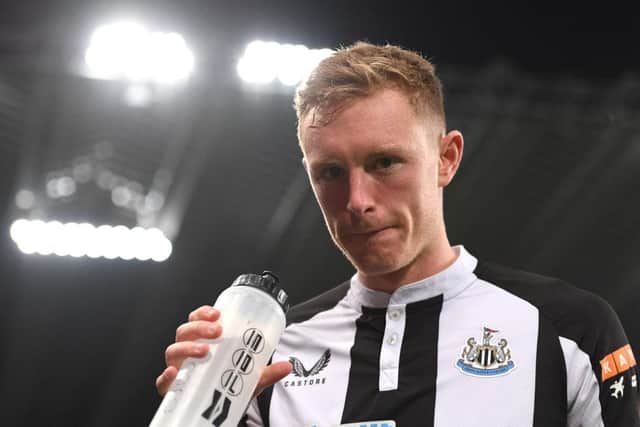 Sean Longstaff takes a drink before the Leeds United game.