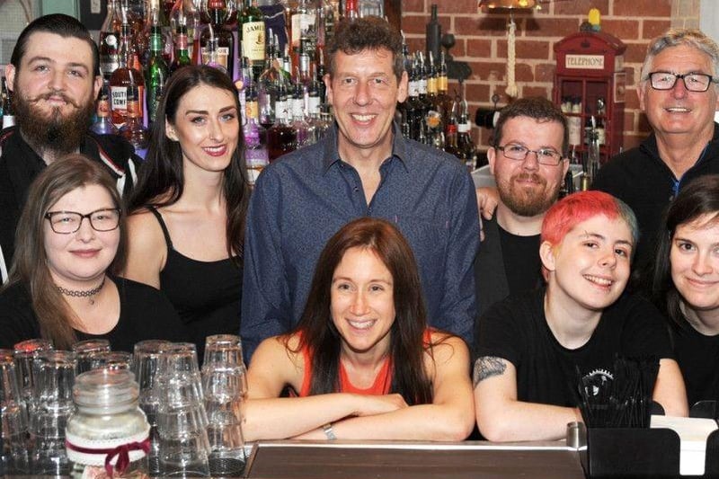 We published this lovely group picture in 2019 when a popular town bar celebrated 20 years of business. What's the name of the bar?