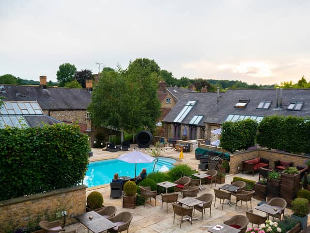 The showstopping Mediterranean terrace and outdoor heated pool.