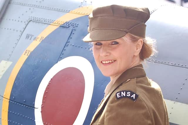 Lorri Brown portrays Vera Lynn.