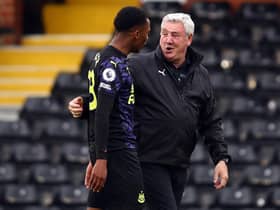 LONDON, ENGLAND - MAY 23: Steve Bruce manager of Newcastle United with Joe Willock after the Premier League match between Fulham and Newcastle United at Craven Cottage on May 23, 2021 in London, United Kingdom. (Photo by Marc Atkins/Getty Images)