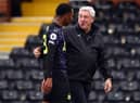 LONDON, ENGLAND - MAY 23: Steve Bruce manager of Newcastle United with Joe Willock after the Premier League match between Fulham and Newcastle United at Craven Cottage on May 23, 2021 in London, United Kingdom. (Photo by Marc Atkins/Getty Images)