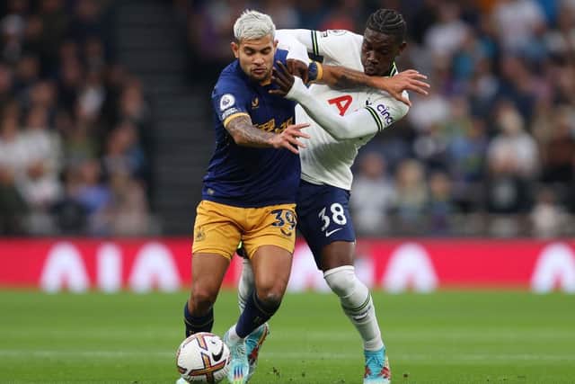 Yves Bissouma of Tottenham Hotspur battles for possession with Bruno Guimaraes of Newcastle United during the Premier League match between Tottenham Hotspur and Newcastle United at Tottenham Hotspur Stadium on October 23, 2022 in London, England. (Photo by Julian Finney/Getty Images)