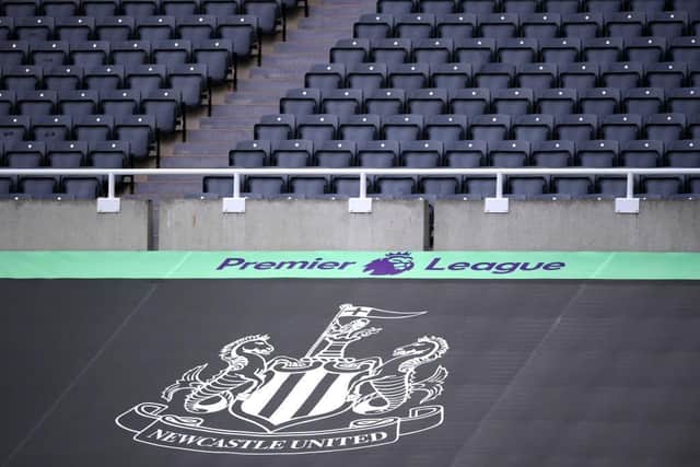 NEWCASTLE UPON TYNE, ENGLAND - JULY 05: General view inside the stadium where a Newcastle United banner is seen alongside the Premier League logo  (Photo by Laurence Griffiths/Getty Images)