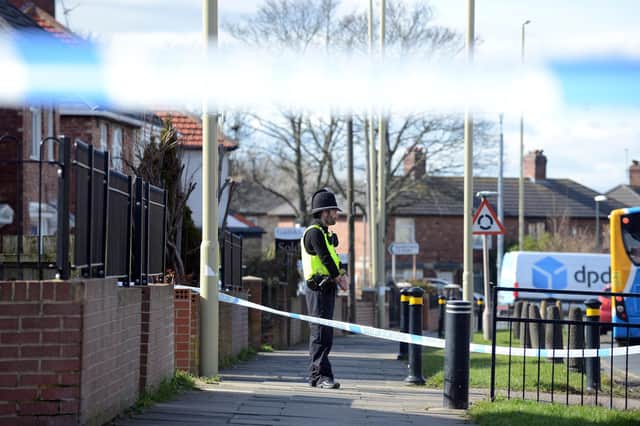 Police at the scene in Prince Edward Road on March 15.