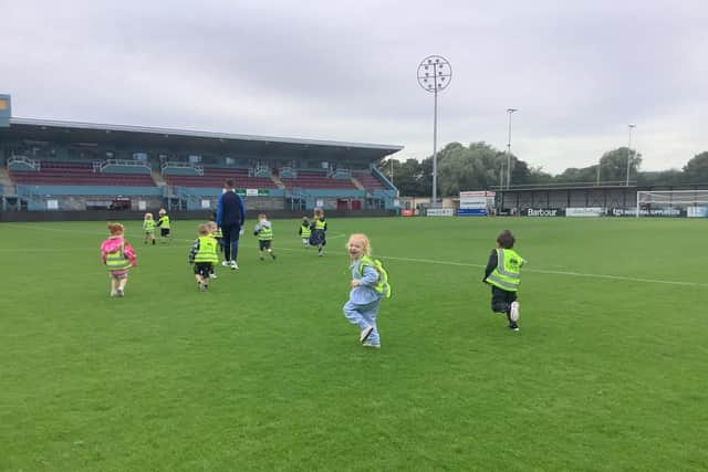 Children from Nurserytime South Shields enjoying their trip to the home of The Mariners.