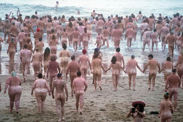 People taking part in a previous North East Skinny Dip at Druridge Bay in Nothumberland. Picture by Owen Humphreys/PA Wire.