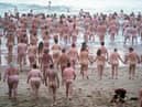 People taking part in a previous North East Skinny Dip at Druridge Bay in Nothumberland. Picture by Owen Humphreys/PA Wire.