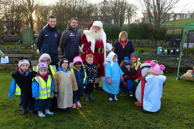 Staff and children from Nurserytime held an outdoor nativity and carol service in North Marine park South Shields, watched by Mayor of South Tyneside Councillor Jean Copp (standing right) Nathan Kew and Jon Shaw of South Shields FC, and Santa Claus.