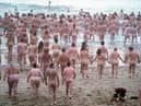 A previous North East Skinny Dip at Druridge Bay in Nothumberland. Picture by Owen Humphreys/PA Wire.