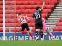 Charlie Wyke scores his hat-trick goal