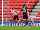 Charlie Wyke scores his hat-trick goal